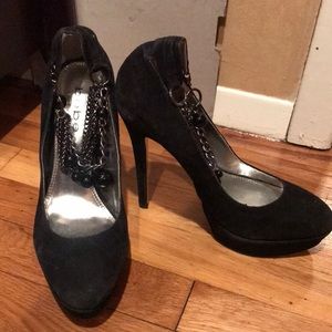 Bebe stilettos with beads around ankle.